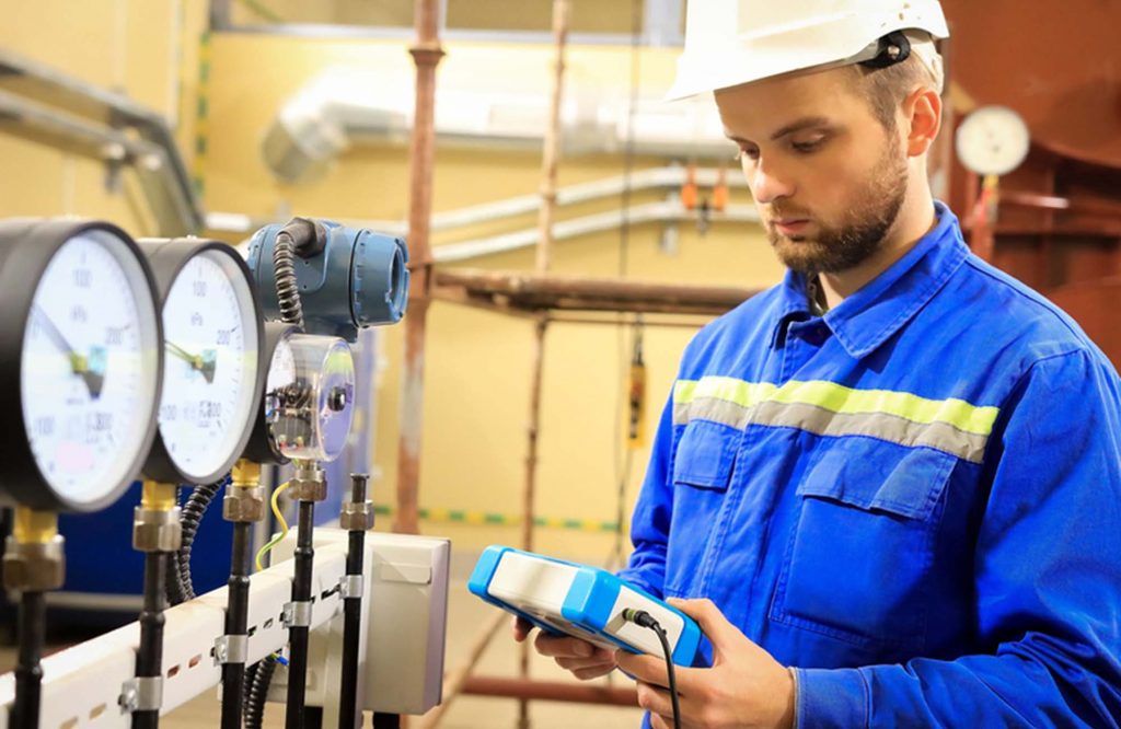 Maintenance engineer controls a work technological process and